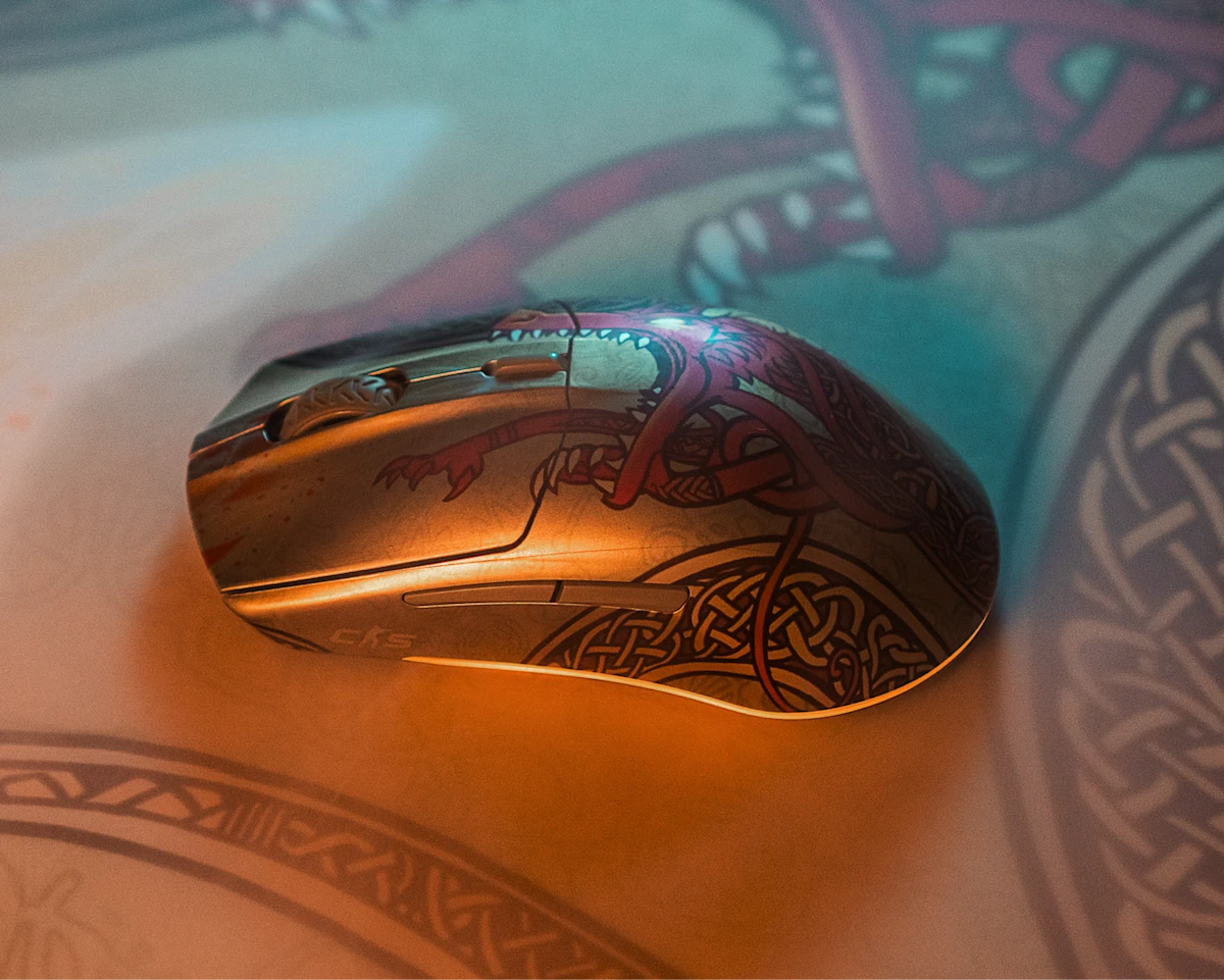 უსადენო Gaming მაუსი SteelSeries Wireless Gaming Mouse CS2 Dragon Lore Edition (62614_SS) | 2.4GHz / Bluetooth 5.0 | Shape  Ergonomic, Right-Handed | Grip Style: Claw or Fingertip | Number of Buttons  6 | 3 RGB Zones | Up to 80 hours 2.4GHz Up to 200 hours Bluetooth | Weight  71g